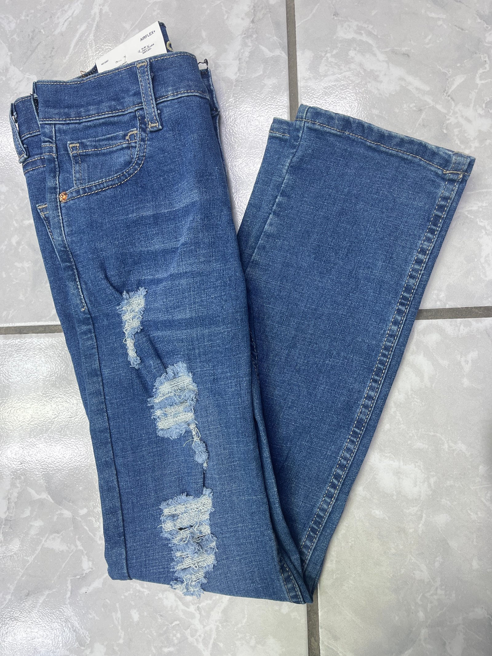 Pantalón Rasgado